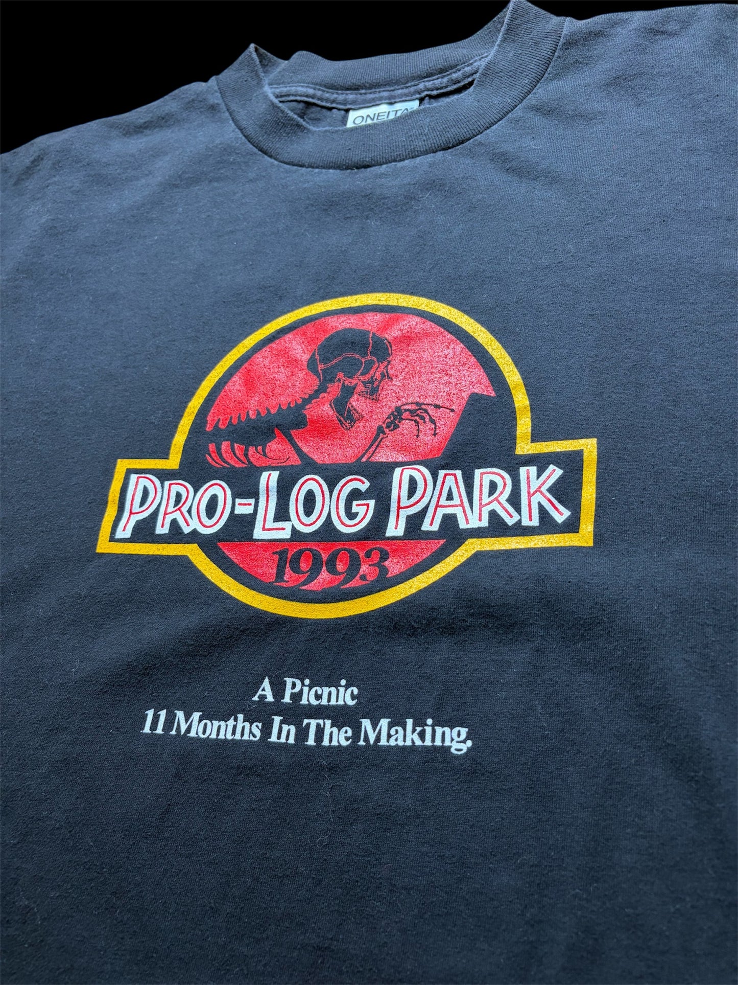 1993 'PRO-LOG PARK' Jurassic Park Parody Tee XL — Oneita Made in USA